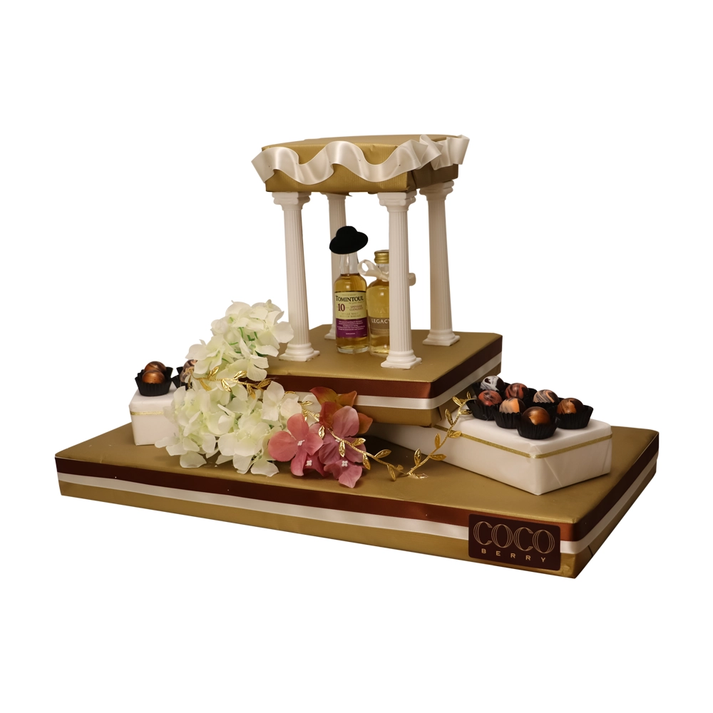 Gazebo arrangement with flowers and chocolates
